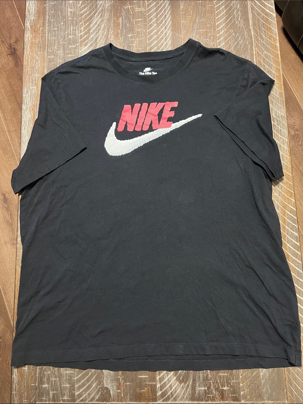 Nike Black Short-Sleeve Tee with Red Logo and White Swoosh